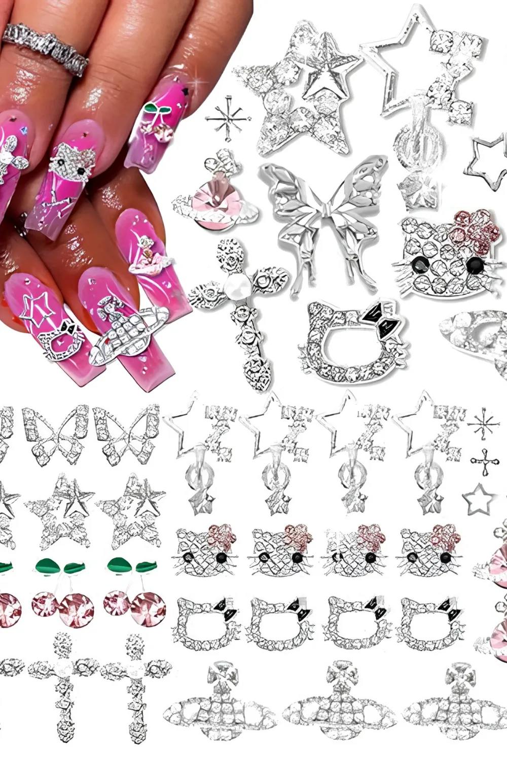 A composite graphic showcasing hot pink Y2K press-on nails alongside a catalogue of silver 3D metal charms. The nails feature jelly pink polish heavily decorated with chunky metallic charms, including hello kitty faces, Saturn orb planets, stars, butterflies, and crosses, surrounded by loose charm swatches for DIY nail art customization.